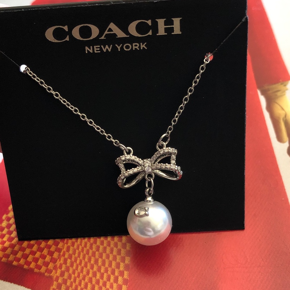 Authentic New on card Coach Silver Bow Pendant Necklace with Pearl Drop